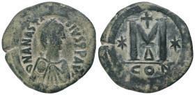 ANASTASIUS I.(491-518).Constantinople.Follis.
Obv : DN ANASTASIVS PP AVG.
Pearl diademed, draped, cuirassed bust to right.
Rev : Large M, star left...
