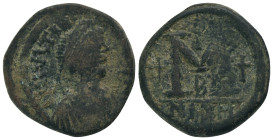 JUSTIN I. 518-527 AD. Nicomedia mint.AE Follis. DN IVSTINVS PP AVG, pearl diademed, draped, cuirassed bust right / Large M, star to left, cross above,...