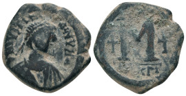 JUSTIN I. 518-527 AD. Nicomedia mint.AE Follis. DN IVSTINVS PP AVG, pearl diademed, draped, cuirassed bust right / Large M, star to left, cross above,...