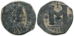 JUSTINIAN I (527-565). Theoupolis (Antioch). Follis.
Obv : D N IVSTINIANVS P P AVG.
Diademed, draped and cuirassed bust right.
Rev : Large M; star ...