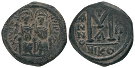 JUSTIN II and SOPHIA.(565-578).Nicomedia.Follis.
Obv : D N IVSTINVS P P AVG.
Justin II on left, Sophia on right, seated facing on double-throne, bot...