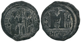 JUSTIN II and SOPHIA.(565-578).Antioch.Follis.
Obv : DN IVSTINVS PP AVG.
Justin and Sophia enthroned facing, holding between them globus cruciger.
...