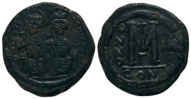 JUSTIN II with SOPHIA.(565-578).Constantinople.Follis.
Obv : D N IVSTINVS PP AVG.
Legend with Justin left holding globus cruciger and Sophia right h...