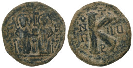 JUSTIN II and SOPHIA.(565-578).Antioch.Half Follis.
Obv : Justin left and Sophia right, seated facing on double-throne, both nimbate, each holding a ...