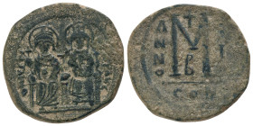 JUSTIN II with SOPHIA.(565-578).Constantinople.Follis.
Obv : D N IVSTINVS PP AVG.
Legend with Justin left holding globus cruciger and Sophia right h...