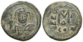 MAURICE TIBERIUS.(582-602).Constantinople.Follis.
Obv : D N MAVRIC TIЬЄR P P AV.
Crowned facing bust, wearing consular robes and holding mappa and e...