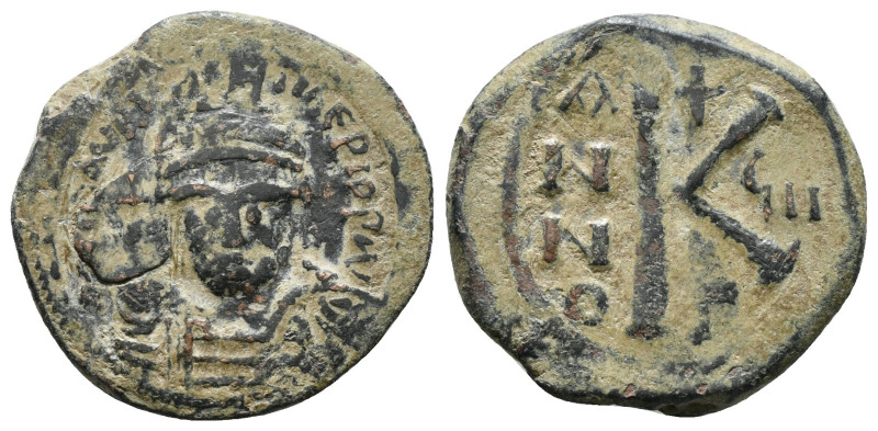 MAURICE TIBERIUS (582-602). Half Follis. Antioch.
Ob v: d N mAYΓI CN P AYΓ.
Cr...