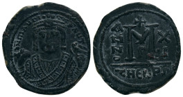 MAURICE TIBERIUS.(582-602).Antioch.Follis.
Obv : D N MAURI C N P AVT.
Crowned facing bust, wearing consular robes, holding mappa and eagle-tipped sc...