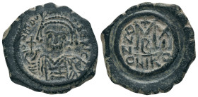 MAURICE TIBERIUS.(582-602). Nicomedia.Follis.
Obv : D N MAVR BIRЄ P P.
Helmeted and cuirassed bust facing, holding globus cruciger and shield decora...
