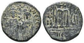 PHOCAS with LEONTIA (602-610). Theoupolis (Antioch).Follis.
Obv : D N FOCA NЄ PЄ AV.
Phocas, holding globus cruciger, and Leontia, holding cruciform...