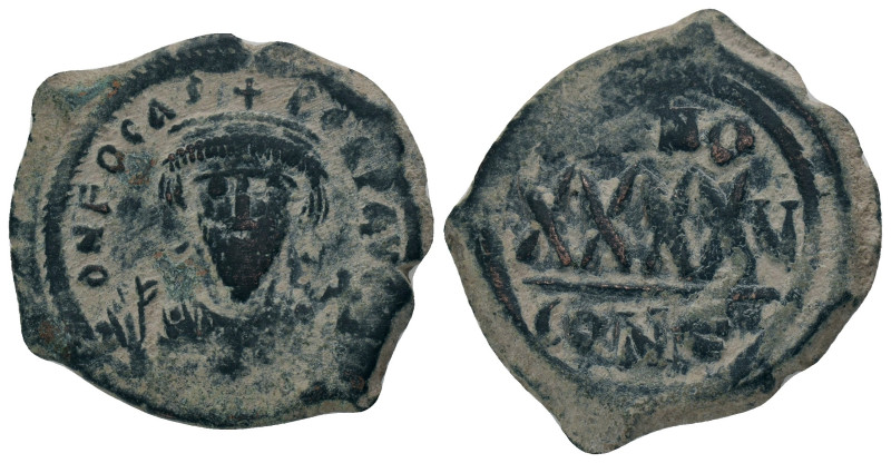 PHOCAS. 602-610 AD. Constantinople mint.AE Follis. DM FOCAE PP AVG, crowned, man...