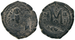 HERACLIUS, with HERACLIUS CONSTANTINE (610-641). Follis. Constantinople.
Obv: Heraclius and Heraclius Constantine standing facing, each crowned and h...