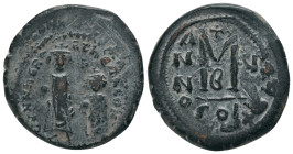 HERACLIUS, with HERACLIUS CONSTANTINE (610-641). Follis. Constantinople.
Obv: Heraclius and Heraclius Constantine standing facing, each crowned and h...