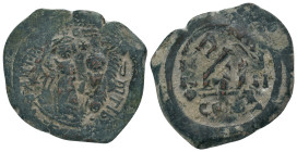 HERACLIUS, with HERACLIUS CONSTANTINE (610-641). Follis. Constantinople.
Obv: Heraclius and Heraclius Constantine standing facing, each crowned and h...