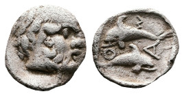 Islands off Thrace, Thasos, circa 412-404 BC. AR Hemiobol (7.85 mm, 0.36 g.). Head of bald and bearded Silenos to right. Rev. Θ-Α-Σ, Two dolphins, one...