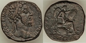 Commodus (AD 177-192). AE sestertius (28mm, 23.17 gm, 6h). VF. Rome, AD 185. M COMMODVS ANT ON AVG PIVS BRIT, laureate head right / P M TR P X IMP VII...