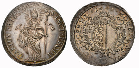 Luzern. Stadt und Kanton. Taler 1698, Luzern. Ovales, reich verziertes Stadtwappen, darüber geflügelter Engelskopf. Rv. Stehender hl. Leodegar im voll...