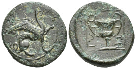 Ionia, Teos. civic issue. Ca. 210-190 B.C. AE (13mm, 1.6 g). Griffin seated right, raising forepaw / [TH]IΩN, ethnic vertically downwards to right of ...