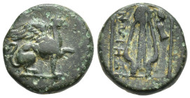 Ionia, Teos. Ae, (12mm, 1.7 g). Circa 210-190 BC. Obv: Griffin seated to right, raising forepaw Rev: Lyre; THIΩN to right, horse's hoof to left; all w...