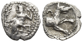 Lykaonia, Laranda AR Obol. Circa 324/3 BC. (10mm, 0,5 g) Baaltars seated left, holding grain ear, grape bunch, and sceptre Rev. Forepart of wolf right...