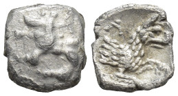 Lykaonia, Laranda AR Obol. Circa 324/3 BC. (8mm, 0,55 g) Baaltars seated left, holding grain ear, grape bunch, and sceptre Rev. Forepart of wolf right...
