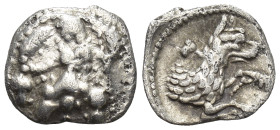 Lykaonia, Laranda AR Obol. Circa 324/3 BC. (9mm, 0,55 g) Baaltars seated left, holding grain ear, grape bunch, and sceptre Rev. Forepart of wolf right...