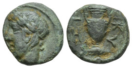 MYSIA. Kyzikos. Ae (8mm, 0,66 g) (Circa 4th Century BC) . Obv: Laureate head of Apollo left. Rev: KY -HI. Amphora; below, tunny right.