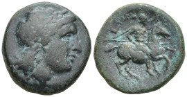 IONIA. Kolophon. Ae (17mm, 4.3 g) (Circa 330-285 BC). Obv: Laureate head of Apollo right. Rev: KOΛ Soldier on horse riding right, holding spear; lyre ...
