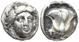 ISLANDS off CARIA, Rhodos. Rhodes. Circa 340-316 BC. AR Didrachm (18mm, 6.2 g). Chian standard. Head of Helios facing slightly right / Rose with bud t...