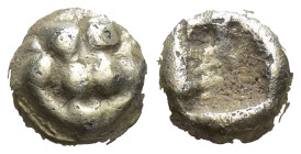 KINGS OF LYDIA. Alyattes (Circa 620/10-564/53 BC). EL 1/24 Stater. (6mm, 0,62 g) Obv: Paw of lion. Rev: Patterned incuse square punch.