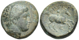 Macedonian Kingdom. Philip II. 359-336 B.C. AE (17mm, 6.4 g). Diademed head of Apollo right / ΦΙΛΙΠΠΟΥ, Name above naked youth riding horse right, bet...