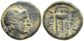 SELEUKID KINGDOM. Antiochos II Theos (261-246 BC). Ae. (18mm, 7.9 g) Sardes. Obv: Laureate head of Apollo right. Rev: BAΣΙΛΕΩΣ / ANTIOXOY. Tripod. Con...