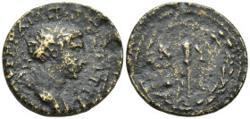 Mysia, Cyzicus. Trajan. A.D. 98-117. AE (20mm, 4,6 g). Antius Quadratus, magistrate. Laureate head of Trajan right / Flaming torch, KYZI within wreath...