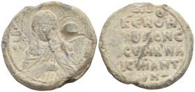 Bust of the Mother of God holding the Child on her left, with her head turned towards Christ. Sigla: ΘΥ̣̅ : [Μ(ήτη)ρ] Θ(εο)ῦ. (18.7 Gr. 27mm....