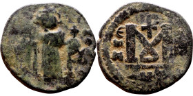 al-Malik ibn Marwan (687-705), Constans II style folis Obverse: Imperial figure holding globus Reverse: m and inscription