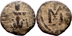 al-Malik ibn Marwan (687-705), Constans II style folis Obverse: Imperial figure holding globus Reverse: m and inscription