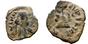 al-Malik ibn Marwan (687-705) Follis. Obverse: Imperial figure. Reverse: Modified cross potent set on steps