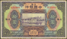 CHINA. 10 Yuan. 1924. Bank of China. Shanghai. (Pick: 62). 3 cm cut in the center of the paper with a hole. Very Fine.