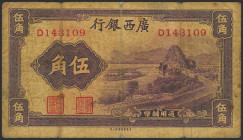 CHINA. 5 Chiao. (1938ca). Kwangsi Bank. (Pick: S2382). Pinhole, adhesive paper added above and below the central fold. Fine.