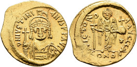 Justinian I, 527-565. Solidus (Gold, 20 mm, 4.48 g, 6 h), Constantinopolis, 545-565. D N IVSTINIANVS P P AVG Helmeted and cuirassed bust of Justinian ...