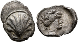 CALABRIA. Tarentum. Circa 470-450 BC. Litra (Silver, 9 mm, 0.65 g, 10 h). Cockle shell within linear circle. Rev. Female head (Satyria?) to right; all...