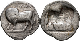 LUCANIA. Sybaris. Circa 550-510 BC. Stater (Silver, 27 mm, 7.21 g, 12 h). Bull standing to left on dotted ground line, head turned back to right; abov...
