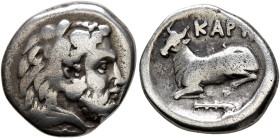 EUBOIA. Karystos. 4th-3rd centuries BC. Drachm (Silver, 17 mm, 3.57 g, 7 h). Head of Herakles to right, wearing lion skin headdress. Rev. KAPY Bull re...