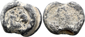 Anonymous, 3rd century. Seal (Lead, 20 mm, 13.45 g). A woman and a man dancing, holding hands, their other hands reaching towards each other above (a ...