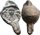 Imperial, circa 350-450. Seal (Lead, 28 mm, 9.09 g). Draped imperial bust facing; to left and right, two smaller heads facing inward. Cf. Leukel N147....