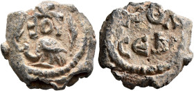 Petros and Sergios, circa 6th century. Seal (Lead, 18 mm, 6.36 g, 12 h). Block monogram ΠETPOV Peacock standing left, palm branches in the fields. Rev...