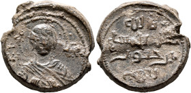 al-Masih, son of Khabuz, 11th century. Seal (Lead, 20 mm, 9.19 g, 12 h). MHP ΘV The Mother of God, nimbate, both hands half-raised before her, palms o...