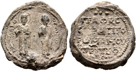 Romanos Touk..., patrikios, 11th century. Seal (Lead, 20 mm, 9.36 g, 12 h). Θ / Π/A/V/Λ/O - Θ / Π/Є/T/P/O Saint Paul and Saint Peter standing facing, ...