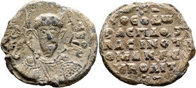 Theodoros Makrembolites, protospatharios and imperial notarios, middle 11th century. Seal (Lead, 26 mm, 9.87 g, 12 h). [Θ / ΘЄ]O-Δ/Ⲱ/PO/C Nimbate faci...