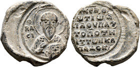 Photios, protospatharios, hypatos and topoteretes of Cappadocia, 11th century. Seal (Lead, 23 mm, 11.33 g, 12 h). Θ / RA/CI-[ΛЄIOC] Nimbate facing bus...